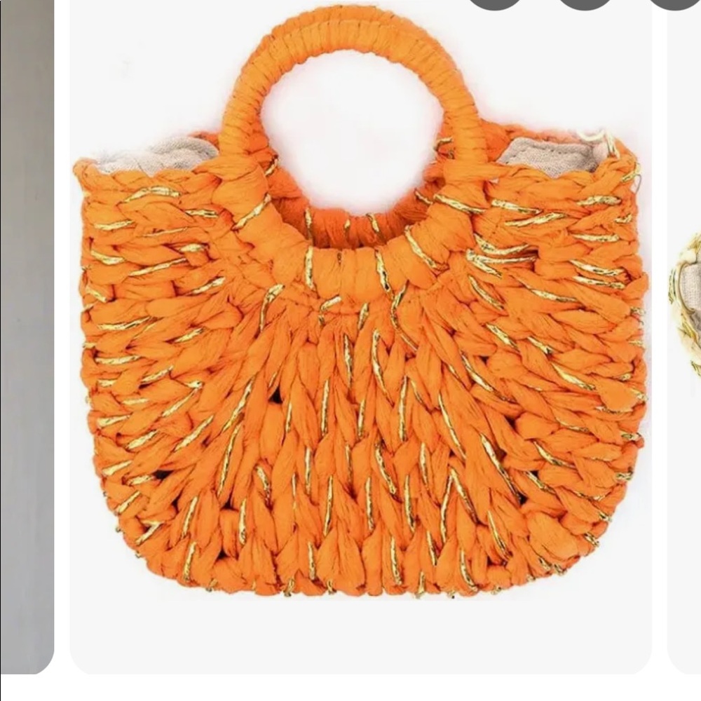BC straw bag with orange and gold accent